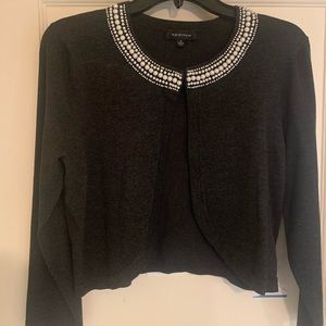 Charcoal grey bolero with Perl trim. Medium